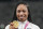 Allyson Felix, of United States, poses with her gold medal for the women's 4 x 400-meter relay at the 2020 Summer Olympics, Saturday, Aug. 7, 2021, in Tokyo. (AP Photo/Martin Meissner)