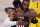 LAKE BUENA VISTA, FLORIDA - AUGUST 29: LeBron James #23 of the Los Angeles Lakers and Carmelo Anthony #00 of the Portland Trail Blazers hug before the start of Game Five of the Western Conference First Round during the 2020 NBA Playoffs at AdventHealth Arena at ESPN Wide World Of Sports Complex on August 29, 2020 in Lake Buena Vista, Florida. NOTE TO USER: User expressly acknowledges and agrees that, by downloading and or using this photograph, User is consenting to the terms and conditions of the Getty Images License Agreement. (Photo by Kevin C. Cox/Getty Images)