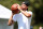 SOUTH LAKE TAHOE, NEVADA - JULY 10: NBA athlete Steph Curry shoots a basketball  on the 17th hole during round two of the American Century Championship at Edgewood Tahoe South golf course on July 10, 2020 in South Lake Tahoe, Nevada.  (Photo by Jed Jacobsohn/Getty Images)