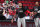PORTLAND, OR - JUNE 3: Damian Lillard #0 of the Portland Trail Blazers high fives his teammate before the game against the Denver Nuggets on June 3, 2021 at the Moda Center Arena in Portland, Oregon. NOTE TO USER: User expressly acknowledges and agrees that, by downloading and or using this photograph, user is consenting to the terms and conditions of the Getty Images License Agreement. Mandatory Copyright Notice: Copyright 2021 NBAE (Photo by Sam Forencich/NBAE via Getty Images)