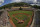 FILE - In this Sunday, Aug. 25, 2019, file photo, River Ridge, Louisiana, lines the third baseline and Curacao lines the first baseline during team introductions before the Little League World Series Championship game at Lamade Stadium in South Williamsport, Pa. The 2020 Little League World Series and the championship tournaments in six other Little League divisions have been canceled because of the new coronavirus pandemic. (AP Photo/Gene J. Puskar, File)