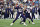 FOXBOROUGH, MA - AUGUST 12: New England Patriots quarterback Mac Jones (10) rears back to pass during a preseason game between the New England Patriots and the Washington Football Team on August 12, 2021, at Gillette Stadium in Foxborough, Massachusetts. (Photo by Fred Kfoury III/Icon Sportswire via Getty Images)