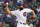 Chicago Cubs starting pitcher Jake Arrieta throws to a Milwaukee Brewers batter during the first inning of a baseball game in Chicago, Wednesday, Aug. 11, 2021. (AP Photo/Nam Y. Huh)