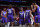LAS VEGAS, NV - AUGUST 17:  Davion Mitchell #15 of the Sacramento Kings high fives teammates during the game against the Boston Celtics during the 2021 Las Vegas Summer League Championship Game on August 17, 2021 at the Thomas & Mack Center in Las Vegas, Nevada. NOTE TO USER: User expressly acknowledges and agrees that, by downloading and or using this Photograph, User is consenting to the terms and conditions of the Getty Images License Agreement. Mandatory Copyright Notice: Copyright 2021 NBAE (Photo by Bart Young/NBAE via Getty Images)