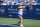 Ashleigh Barty, of Australia, returns to Angelique Kerber, of Germany, during the Western & Southern Open tennis tournament Saturday, Aug. 21, 2021, in Mason, Ohio. (AP Photo/Aaron Doster)