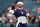 New England Patriots' Cam Newton warms up before a preseason NFL football game against the Philadelphia Eagles on Thursday, Aug. 19, 2021, in Philadelphia. (AP Photo/Matt Rourke)