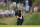 Patrick Cantlay chips onto the fourth green during the third round of the BMW Championship golf tournament, Saturday, Aug. 28, 2021, at Caves Valley Golf Club in Owings Mills, Md. (AP Photo/Julio Cortez)