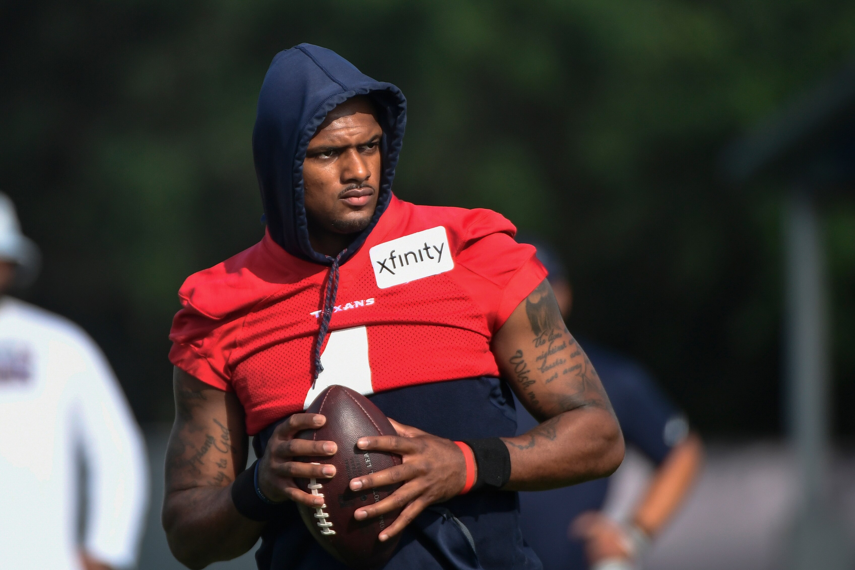 FILE- In an Aug. 2, 2021 file photo, Texans quarterback Deshaun Watson practices with the team during NFL football practice in Houston. Attorneys involved in the lawsuits accusing Watson of sexual assault and harassment say the FBI has become involved in the case. Tony Buzbee, the attorney for the 22 women who have sued Watson, said Wednesday, Aug. 18, 2021 he and some of his clients have spoken with FBI agents about the allegations against Watson.(AP Photo/Justin Rex_file)