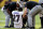Baltimore Ravens running back J.K. Dobbins (27) is helped off the field during an NFL preseason football game against the Washington Football Team, Saturday, Aug. 28, 2021 in Landover, Md. (AP Photo/Daniel Kucin Jr.)