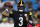 Pittsburgh Steelers quarterback Dwayne Haskins passes against the Carolina Panthers during the second half of a preseason NFL football game Friday, Aug. 27, 2021, in Charlotte, N.C. (AP Photo/Jacob Kupferman)
