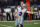 Dallas Cowboys quarterback Garrett Gilbert hands the ball off in the first half of a preseason NFL football game against the Jacksonville Jaguars in Arlington, Texas, Sunday, Aug. 29, 2021. (AP Photo/Ron Jenkins)