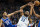 PHILADELPHIA, PA - OCTOBER 30: Ben Simmons #25 of the Philadelphia 76ers and Karl-Anthony Towns #32 of the Minnesota Timberwolves compete for the ball at the Wells Fargo Center on October 30, 2019 in Philadelphia, Pennsylvania. NOTE TO USER: User expressly acknowledges and agrees that, by downloading and or using this photograph, User is consenting to the terms and conditions of the Getty Images License Agreement. (Photo by Mitchell Leff/Getty Images)
