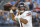 Chicago Bears quarterback Justin Fields passes against the Tennessee Titans during an NFL football game Saturday, Aug. 28, 2021, in Nashville, Tenn. (AP Photo/John Amis)