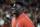 New Orleans Pelicans' Zion Williamson watches from the sideline during the first half of an NCAA college football game between Southern California and Stanford on Saturday, Sept. 11, 2021, in Los Angeles. (AP Photo/Marcio Jose Sanchez)