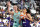 Phoenix Mercury guard Skylar Diggins-Smith drives past New York Liberty guard Sabrina Ionescu (20) during the first half in the first round of the WNBA basketball playoffs, Thursday, Sept. 23, 2021, in Phoenix. (AP Photo/Rick Scuteri)