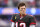 INGLEWOOD, CALIFORNIA - SEPTEMBER 26: Tom Brady #12 of the Tampa Bay Buccaneers on the sideline during the first quarter in the game against the Los Angeles Rams at SoFi Stadium on September 26, 2021 in Inglewood, California. (Photo by Harry How/Getty Images)