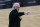 San Antonio Spurs head coach Gregg Popovich talks to his players during the first half of an NBA basketball game against the Miami Heat in San Antonio, Wednesday, April 21, 2021. (AP Photo/Eric Gay)