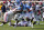 Mississippi quarterback Matt Corral (2) runs for a first down during the first half of an NCAA college football game against Arkansas, Saturday, Oct. 9, 2021, in Oxford, Miss. (AP Photo/Rogelio V. Solis)