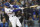 Los Angeles Dodgers' Chris Taylor flies out to end the third inning, stranding three runners during Game 4 of the baseball team's National League Division Series against the San Francisco Giants, Tuesday, Oct. 12, 2021, in Los Angeles. (AP Photo/Ashley Landis)