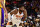 PHOENIX, AZ - OCTOBER 6:  Deandre Ayton #22 of the Phoenix Suns looks on during the game against the Los Angeles Lakers during a preseason game on October 6, 2021 at Footprint Center in Phoenix, Arizona. NOTE TO USER: User expressly acknowledges and agrees that, by downloading and or using this photograph, user is consenting to the terms and conditions of the Getty Images License Agreement. Mandatory Copyright Notice: Copyright 2021 NBAE (Photo by Barry Gossage/NBAE via Getty Images)