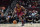 Cleveland Cavaliers' Collin Sexton starts a fast break during an NBA preseason basketball game against the Chicago Bulls Tuesday, Oct. 5, 2021, in Chicago. (AP Photo/Charles Rex Arbogast)