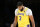 Los Angeles Lakers forward Anthony Davis (3) looks down during the second half of an NBA basketball game against the Golden State Warriors in Los Angeles, Tuesday, Oct. 19, 2021. The Warriors won 121-114. (AP Photo/Ringo H.W. Chiu)
