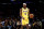 Los Angeles Lakers guard Rajon Rondo (4) dribbles against the Golden State Warriors during the first half of an NBA basketball game in Los Angeles, Tuesday, Oct. 19, 2021. (AP Photo/Ringo H.W. Chiu)