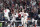 Atlanta, GA - October 23: Atlanta Braves' Eddie Rosario, from left, celebrates while approaching home off a three-run home run as Joc Pederson and Ozzie Albies wait during the fourth inning in game six in the 2021 National League Championship Series against the Los Angeles Dodgers at Truist Park on Saturday, Oct. 23, 2021 in Atlanta, GA. (Wally Skalij / Los Angeles Times via Getty Images)