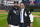 CHICAGO - OCTOBER 12:  White Sox legend Ozzie Guillen poses with Seby Zavala of the Chicago White Sox after throwing out the ceremonial first pitch prior to Game Four of the American League Division Series against the Houston Astros on October 12, 2021 at Guaranteed Rate Field in Chicago, Illinois.  (Photo by Ron Vesely/Getty Images)