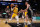 SAN ANTONIO, TX - OCTOBER 26: Russell Westbrook #0 of the Los Angeles Lakers drives to the basket against the San Antonio Spurs on October 26, 2021 at the AT&T Center in San Antonio, Texas. NOTE TO USER: User expressly acknowledges and agrees that, by downloading and or using this photograph, user is consenting to the terms and conditions of the Getty Images License Agreement. Mandatory Copyright Notice: Copyright 2021 NBAE (Photos by Darren Carroll/NBAE via Getty Images)