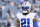 Dallas Cowboys running back Ezekiel Elliott (21) focuses prior to an NFL football game against the New England Patriots, Sunday, Oct. 17, 2021, in Foxborough, Mass. (AP Photo/Greg M. Cooper)