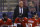 Florida Panthers head coach Joel Quenneville looks on from the bench during the first period of an NHL hockey game against the Boston Bruins Wednesday, Oct. 27, 2021, in Sunrise, Fla. (AP Photo/Jim Rassol)