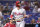 Philadelphia Phillies' Bryce Harper walks to the dugout after striking out during the first inning of a baseball game against the Miami Marlins, Saturday, Oct. 2, 2021, in Miami. (AP Photo/Lynne Sladky)