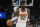 Phoenix Suns center Deandre Ayton (22) during the first half of an NBA basketball game against the Sacramento Kings, Wednesday, Oct. 27, 2021, in Phoenix. (AP Photo/Rick Scuteri)
