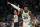 Boston Celtics' Marcus Smart celebrates his three-pointer during the first half of an NBA basketball game against the Chicago Bulls, Monday, Nov. 1, 2021, in Boston. (AP Photo/Michael Dwyer)