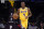 Los Angeles Lakers guard Rajon Rondo (4) dribbles during the first half of an NBA basketball game against the Oklahoma City Thunder Thursday, Nov. 4, 2021, in Los Angeles. (AP Photo/Marcio Jose Sanchez)