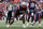 FOXBOROUGH, MA - NOVEMBER 14: New England Patriots offensive lineman Trent Brown (77) gets set for a play during a game between the New England Patriots and the Cleveland Browns on November 14, 2021, at Gillette Stadium in Foxborough, Massachusetts. (Photo by Fred Kfoury III/Icon Sportswire via Getty Images)