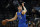 Dallas Mavericks guard Luka Doncic (77) moves the ball up court against the San Antonio Spurs during the first half of an NBA basketball game, Friday, Nov. 12, 2021, in San Antonio. (AP Photo/Eric Gay)