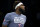 CHARLOTTE, NORTH CAROLINA - NOVEMBER 12: Mitchell Robinson #23 of the New York Knicks looks on prior to the first half of their game against the Charlotte Hornets at Spectrum Center on November 12, 2021 in Charlotte, North Carolina. NOTE TO USER: User expressly acknowledges and agrees that, by downloading and or using this photograph, User is consenting to the terms and conditions of the Getty Images License Agreement. (Photo by Jared C. Tilton/Getty Images)