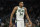 Milwaukee Bucks' Giannis Antetokounmpo reacts after scoring during the first half of an NBA basketball game against the Los Angeles Lakers Wednesday, Nov. 17, 2021, in Milwaukee. (AP Photo/Morry Gash)