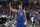 Dallas Mavericks' Dirk Nowitzki stands on the court during an NBA basketball game against the Phoenix Suns in Dallas, Tuesday, April 9, 2019. (AP Photo/Tony Gutierrez)