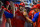 MIAMI, FLORIDA - OCTOBER 03: Bryce Harper #3 of the Philadelphia Phillies is congratulated by teammates after scoring during the third inning against the Miami Marlins at loanDepot park on October 03, 2021 in Miami, Florida. (Photo by Eric Espada/Getty Images)