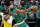 Boston Celtics' Jayson Tatum (0) goes up to shoot against Los Angeles Lakers' LeBron James, left, during the first half of an NBA basketball game, Friday, Nov. 19, 2021, in Boston. (AP Photo/Michael Dwyer)