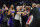 Players separate Detroit Pistons center Isaiah Stewart from Los Angeles Lakers forward LeBron James, not in frame, during the second half of an NBA basketball game, Sunday, Nov. 21, 2021, in Detroit. (AP Photo/Carlos Osorio)