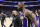 DETROIT, MICHIGAN - NOVEMBER 21: LeBron James #6 of the Los Angeles Lakers is ejected from the game against the Detroit Pistons after delivering a blow to Isaiah Stewart #28 of the Detroit Pistons during the third quarter at Little Caesars Arena on November 21, 2021 in Detroit, Michigan. NOTE TO USER: User expressly acknowledges and agrees that, by downloading and or using this photograph, User is consenting to the terms and conditions of the Getty Images License Agreement. (Photo by Nic Antaya/Getty Images)