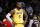 Los Angeles Lakers forward LeBron James (6) looks on against the Sacramento Kings during the second half of an NBA basketball game in Los Angeles, Friday, Nov. 26, 2021. The Kings won 141-137 in triple overtime. (AP Photo/Ringo H.W. Chiu)