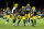 GREEN BAY, WISCONSIN - NOVEMBER 28: Krys Barnes #51 of the Green Bay Packers celebrates with teammates after recovering a fumbled punt catch by J.J. Koski #17 of the Los Angeles Rams (not pictured) during the third quarter at Lambeau Field on November 28, 2021 in Green Bay, Wisconsin. (Photo by Stacy Revere/Getty Images)