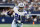 Dallas Cowboys running back Ezekiel Elliott (21) runs against the Atlanta Falcons during an NFL Football game in Arlington, Texas, Sunday, Nov. 14, 2021. (AP Photo/Michael Ainsworth)