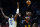 Phoenix Suns guard Chris Paul (3) shoots over Golden State Warriors center Kevon Looney (5) during the first half of an NBA basketball game, Tuesday, Nov. 30, 2021, in Phoenix. (AP Photo/Matt York)