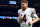 DETROIT, MICHIGAN - NOVEMBER 25: Andy Dalton #14 of the Chicago Bears exits the field after a win over the Detroit Lions at Ford Field on November 25, 2021 in Detroit, Michigan. (Photo by Nic Antaya/Getty Images)